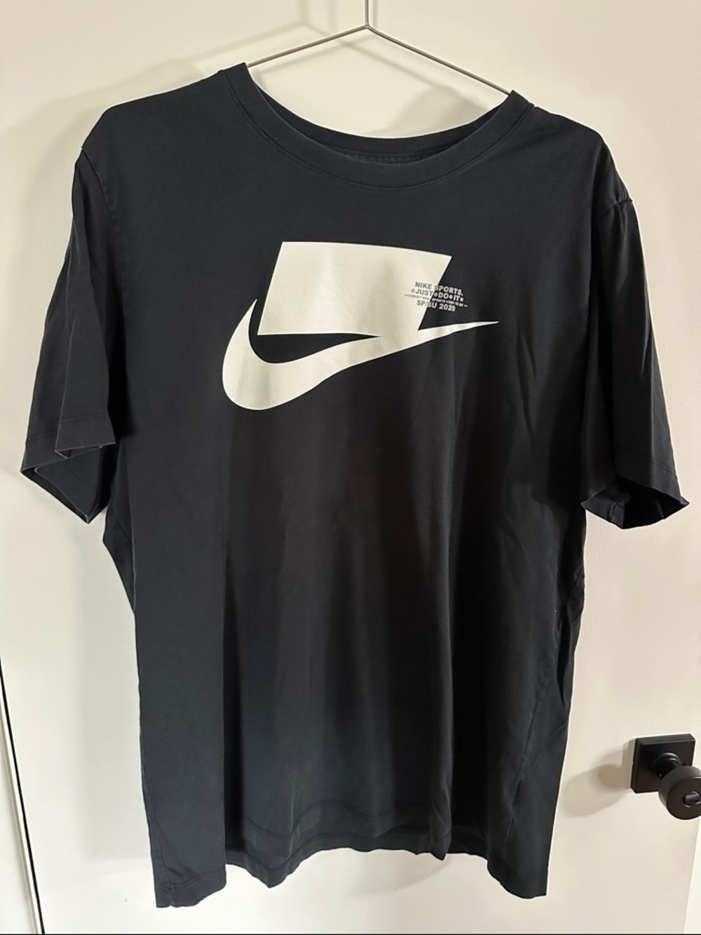 Nike Black Short-Sleeve Tee with White Swoosh Graphic